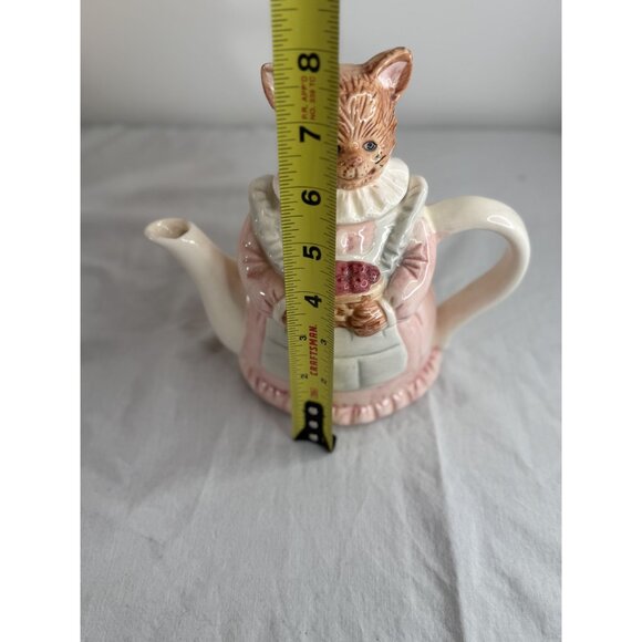 Vintage Ceramic Cat-Shaped Teapot With Pink Dress & Ruffled Collar Holding Baske - Picture 6 of 6